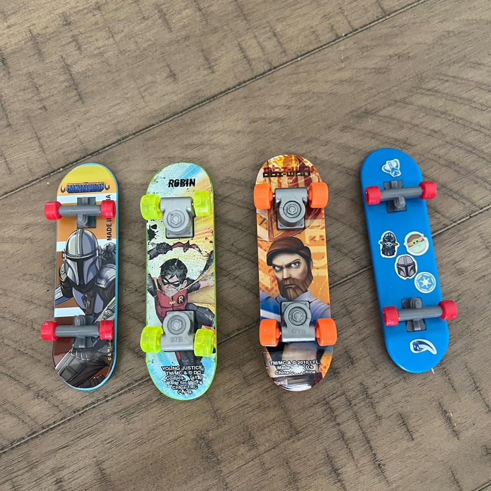 Lot of 4 Fingerboard Skateboards
